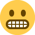 😬 鬼脸表情符号的含义